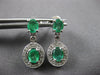 .65CT DIAMOND & AAA EMERALD 14KT WHITE GOLD OVAL & ROUND FLOWER HANGING EARRINGS