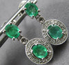 .65CT DIAMOND & AAA EMERALD 14KT WHITE GOLD OVAL & ROUND FLOWER HANGING EARRINGS
