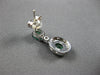 .65CT DIAMOND & AAA EMERALD 14KT WHITE GOLD OVAL & ROUND FLOWER HANGING EARRINGS