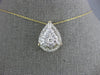 ESTATE 1.0CT DIAMOND 14KT YELLOW GOLD ROUND & BAGUETTE CLUSTER TEAR DROP PENDANT