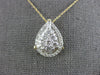 ESTATE 1.0CT DIAMOND 14KT YELLOW GOLD ROUND & BAGUETTE CLUSTER TEAR DROP PENDANT