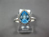 1.17CT DIAMOND & AAA BLUE TOPAZ 14K WHITE GOLD PEAR SHAPE & ROUND HALO LOVE RING
