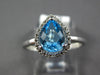 1.17CT DIAMOND & AAA BLUE TOPAZ 14K WHITE GOLD PEAR SHAPE & ROUND HALO LOVE RING
