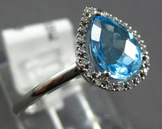 1.17CT DIAMOND & AAA BLUE TOPAZ 14K WHITE GOLD PEAR SHAPE & ROUND HALO LOVE RING