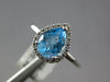 1.17CT DIAMOND & AAA BLUE TOPAZ 14K WHITE GOLD PEAR SHAPE & ROUND HALO LOVE RING
