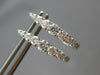 ESTATE .55CT DIAMOND 18KT WHITE GOLD 3D OVAL LEVERBACK HUGGIE HANGING EARRINGS