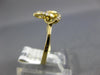 ESTATE .13CT DIAMOND 18KT YELLOW GOLD 3D LOVE KNOT FLOWER STAR FUN RING