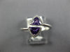 .70CT DIAMOND & AAA AMETHYST 14KT WHITE GOLD TRILLION & ROUND CRISS CROSS RING