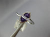 .70CT DIAMOND & AAA AMETHYST 14KT WHITE GOLD TRILLION & ROUND CRISS CROSS RING