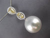 LARGE .98CT WHITE & CANARY DIAMOND & AAA SOUTH SEA PEARL 18KT WHITE GOLD PENDANT