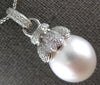 ESTATE LARGE .60CT DIAMOND & AAA SOUTH SEA PEARL 18KT WHITE GOLD FLOWER PENDANT