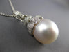 ESTATE LARGE .60CT DIAMOND & AAA SOUTH SEA PEARL 18KT WHITE GOLD FLOWER PENDANT