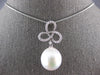 LARGE .36CT DIAMOND AAA SOUTH SEA PEARL 18KT WHITE GOLD LOVE KNOT FLOWER PENDANT