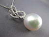 LARGE .36CT DIAMOND AAA SOUTH SEA PEARL 18KT WHITE GOLD LOVE KNOT FLOWER PENDANT