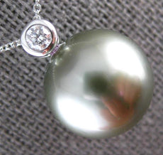 ESTATE .06CT DIAMOND & AAA TAHITIAN PEARL 18KT YELLOW GOLD BEZEL ETOILE PENDANT