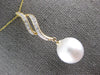 LARGE .12CT DIAMOND & AAA SOUTH SEA PEARL 14KT YELLOW GOLD DOUBLE SWIRL PENDANT