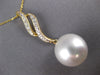 LARGE .12CT DIAMOND & AAA SOUTH SEA PEARL 14KT YELLOW GOLD DOUBLE SWIRL PENDANT