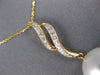 LARGE .12CT DIAMOND & AAA SOUTH SEA PEARL 14KT YELLOW GOLD DOUBLE SWIRL PENDANT