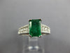 1.45CT DIAMOND & AAA EMERALD 14KT WHITE GOLD EMERALD CUT & ROUND ENGAGEMENT RING