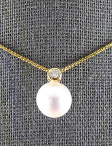 ESTATE .08CT DIAMOND & AAA SOUTH SEA PEARL 18KT YELLOW GOLD BEZEL ETOILE PENDANT