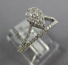 ESTATE 0.57CT DIAMOND 18KT WHITE GOLD 3D CLUSTER PEAR SHAPE CROWN FUN RING