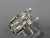 WIDE .47CT DIAMOND 18KT WHITE GOLD ROUND & BAGUETTE CRISS CROSS TENSION FUN RING