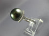 LARGE .53CT DIAMOND & AAA TAHITIAN PEARL 18KT WHITE GOLD CIRCULAR SEMI HALO RING