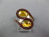 6.69CT CITRINE & ORANGE SAPPHIRE 14KT YELLOW GOLD OVAL & ROUND CRISS CROSS RING