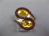 6.69CT CITRINE & ORANGE SAPPHIRE 14KT YELLOW GOLD OVAL & ROUND CRISS CROSS RING