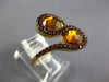6.69CT CITRINE & ORANGE SAPPHIRE 14KT YELLOW GOLD OVAL & ROUND CRISS CROSS RING