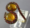 6.69CT CITRINE & ORANGE SAPPHIRE 14KT YELLOW GOLD OVAL & ROUND CRISS CROSS RING
