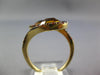 6.69CT CITRINE & ORANGE SAPPHIRE 14KT YELLOW GOLD OVAL & ROUND CRISS CROSS RING