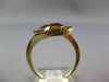 6.69CT CITRINE & ORANGE SAPPHIRE 14KT YELLOW GOLD OVAL & ROUND CRISS CROSS RING