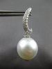 LARGE .48CT DIAMOND & AAA SOUTH SEA PEARL 18KT WHITE GOLD SWIRL HANGING EARRINGS
