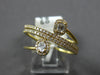.50CT DIAMOND 18KT YELLOW GOLD ROUND BAGUETTE & OVAL MULTI ROW CRISS CROSS RING