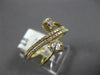 .50CT DIAMOND 18KT YELLOW GOLD ROUND BAGUETTE & OVAL MULTI ROW CRISS CROSS RING