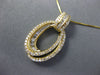 .5CT DIAMOND 14K YELLOW GOLD ROUND & BAGUETTE DOUBLE OVAL HALO LOVE KNOT PENDANT