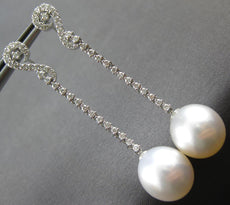 LONG .52CT DIAMOND & AAA SOUTH SEA PEARL 18KT WHITE GOLD SWIRL HANGING EARRINGS