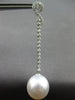 LONG .52CT DIAMOND & AAA SOUTH SEA PEARL 18KT WHITE GOLD SWIRL HANGING EARRINGS