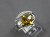 1.37CT DIAMOND & AAA CITRINE 14KT WHITE GOLD CUSHION & ROUND LOVE KNOT FUN RING