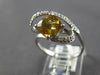 1.37CT DIAMOND & AAA CITRINE 14KT WHITE GOLD CUSHION & ROUND LOVE KNOT FUN RING