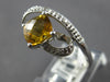 1.37CT DIAMOND & AAA CITRINE 14KT WHITE GOLD CUSHION & ROUND LOVE KNOT FUN RING