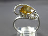 1.37CT DIAMOND & AAA CITRINE 14KT WHITE GOLD CUSHION & ROUND LOVE KNOT FUN RING