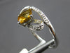 1.37CT DIAMOND & AAA CITRINE 14KT WHITE GOLD CUSHION & ROUND LOVE KNOT FUN RING