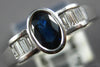 .76CT DIAMOND & AAA SAPPHIRE 18KT WHITE GOLD OVAL BAGUETTE BEZEL ENGAGEMENT RING