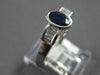 .76CT DIAMOND & AAA SAPPHIRE 18KT WHITE GOLD OVAL BAGUETTE BEZEL ENGAGEMENT RING