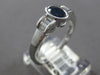 .76CT DIAMOND & AAA SAPPHIRE 18KT WHITE GOLD OVAL BAGUETTE BEZEL ENGAGEMENT RING