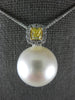 LARGE WHITE & FANCY YELLOW DIAMOND AAA SOUTH SEA PEARL 18KT WHITE GOLD PENDANT