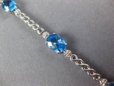 8.14CT DIAMOND & AAA BLUE TOPAZ 14KT WHITE GOLD 3D OVAL & ROUND TENNIS BRACELET