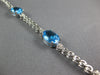 8.14CT DIAMOND & AAA BLUE TOPAZ 14KT WHITE GOLD 3D OVAL & ROUND TENNIS BRACELET